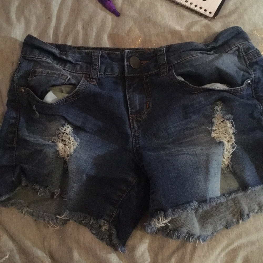 It is a pair of denim short shorts